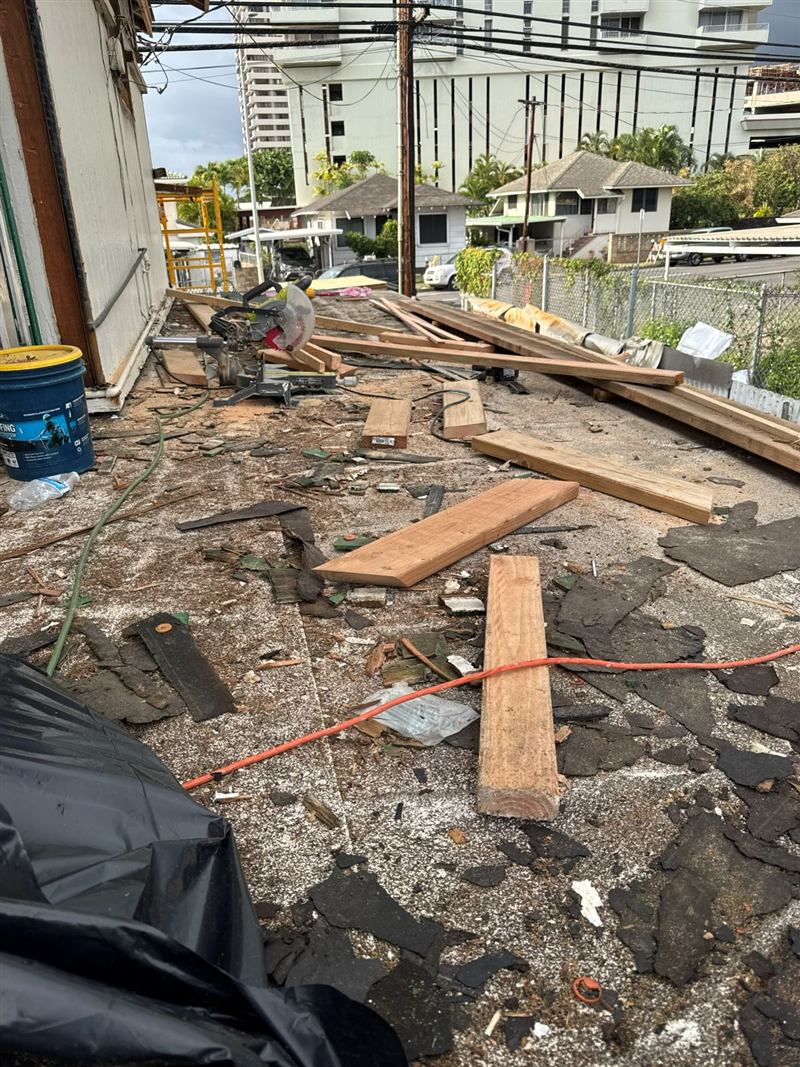Roof tear-off in progress
