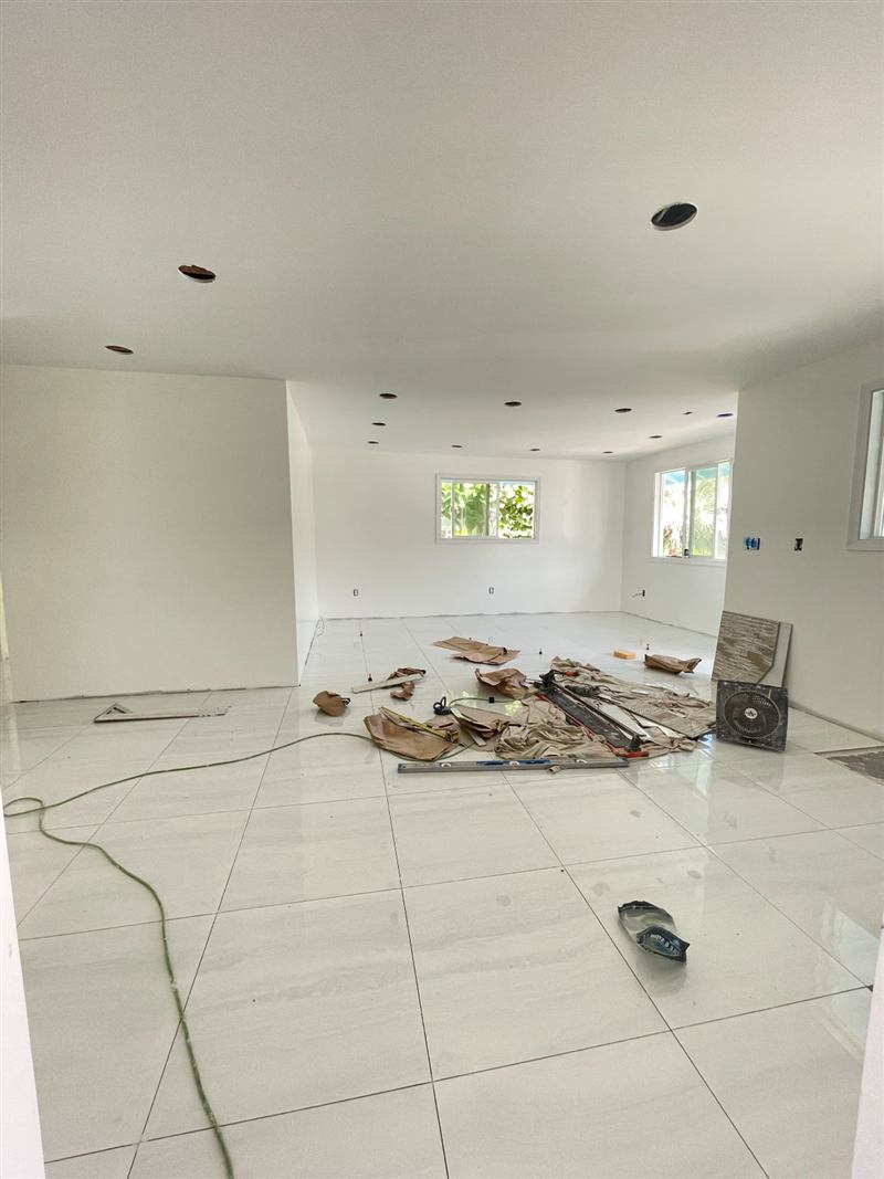 New tile flooring being installed